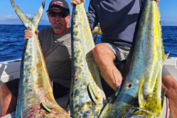a man holding a fish