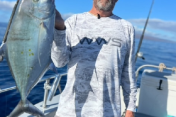 a man holding a fish